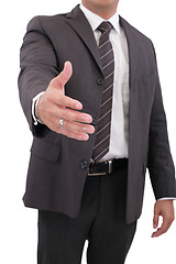 Image showing Business man with hand extended to handshake - isolated over whi