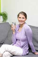 Image showing Happy healthy woman drinking water