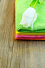 Image showing Towels stack with white tulips