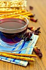 Image showing Tea hibiscus with bread and bread sticks