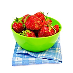 Image showing Strawberries in a green bowl with a napkin