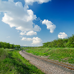 Image showing railway goes to horizon in green landscape