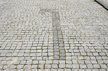 Image showing cobbled road with arrow
