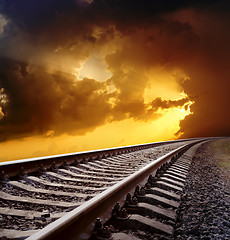 Image showing railway to horizon under dramatic sky