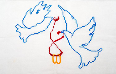 Image showing White doves holding wedding rings