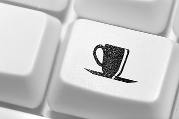 Image showing The button with an emblem of a cup of coffee on the keyboard. A 