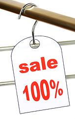 Image showing Sale. A hanger with labels on a white background.