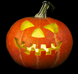 Image showing scary old jack-o-lantern on black.