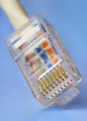 Image showing Cable of a network cat5 on a blue background 