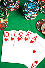 Image showing man with a beard plays poker