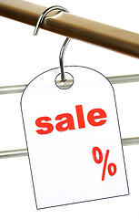 Image showing Sale. A hanger with labels on a white background.