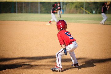 Image showing Little league baseball player trying to steal