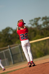 Image showing Youth pitcher checking second base