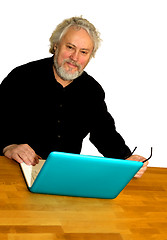Image showing Senior and laptop computer