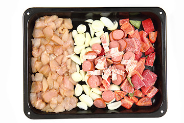 Image showing raw chicken meat with vegetable