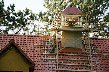 Image showing worker men helmet roof tiles construction industry 