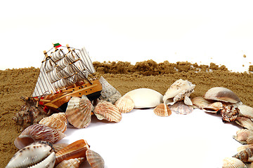 Image showing sand frame with the shells and boat