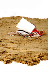 Image showing white paper on the beach with the shells