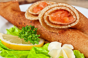 Image showing Pancakes with salmon