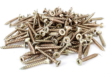 Image showing Closeup pile of screw on white