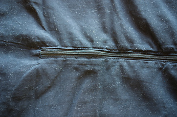 Image showing sweatsuit pants fabric and zip closeup background 