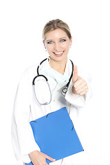 Image showing Happy female doctor giving a thumbds up