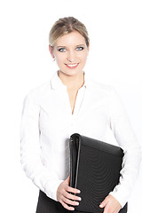 Image showing Smiling office worker carrying a file