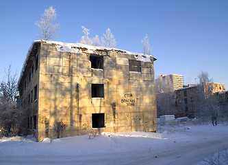 Image showing Abandoned and broken-down house in winter