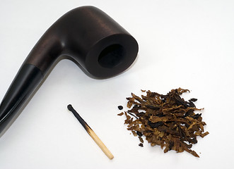 Image showing Pipe, tobacco and burnt match. 