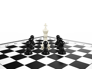 Image showing White chess king surrounded by black chess pawns on a chessboard