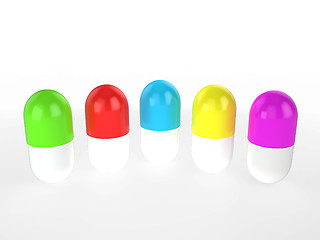 Image showing different colors capsules stand in a row