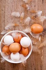 Image showing brown and white eggs in a bowl