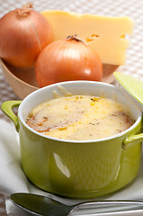 Image showing onion soup with melted cheese and bread on top