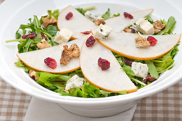 Image showing Fresh pears arugula gorgonzola cheese salad