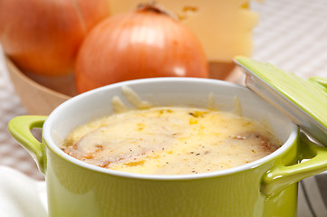 Image showing onion soup with melted cheese and bread on top