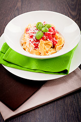 Image showing tasty fresh homemade ravioli and tomato sauce