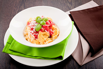 Image showing tasty fresh homemade ravioli and tomato sauce