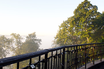 Image showing married traditional sign locks forest downhill fog 