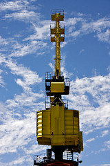 Image showing sky clouds and yellow crane in  buenos aires 