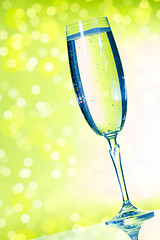 Image showing Champagne glasses on the green background 