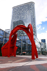 Image showing PARIS - May 8: Red arch in business district of Defense to the w