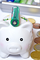 Image showing Piggy bank with accu