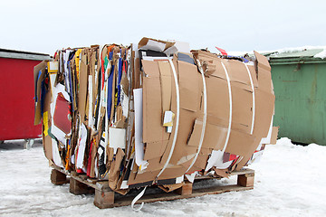 Image showing Pressed Cardboard Boxes Prepared for Recycling