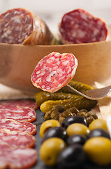 Image showing cold cut platter with pita bread and pickles