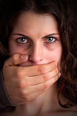 Image showing Woman Silenced by Aggressive Husband