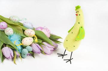 Image showing Easter chicken with tulips and eggs