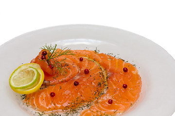 Image showing Salmon carpaccio with pink pepper