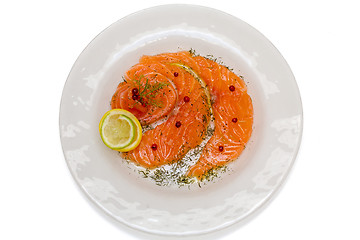 Image showing Salmon carpaccio with pink pepper