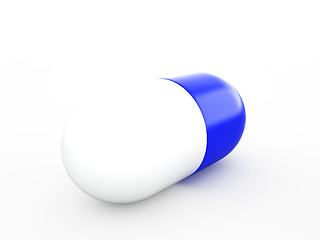 Image showing white-blue capsule isolated on the white