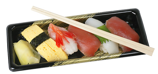 Image showing Sushi tray and chopsticks-clipping path